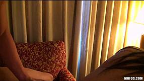 Young couples engage in a group sex experience in a hotel room