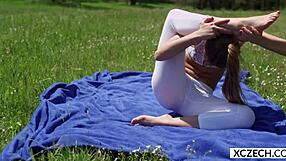 Beautiful Pornstar Alexis Crystal Performs Yoga Outdoors in Spandex