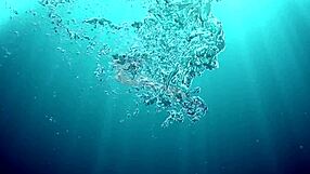 Underwater Solo Play with Purple Dildo by Nora Shmandora at Poolside