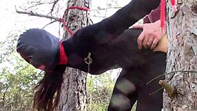 Petite teen tied up for rough outdoor action in stockings