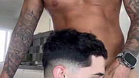 Gay blowjob and handjob action in the kitchen