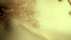 Discover the contrast of a hairy redhead in lingerie taking a big black cock