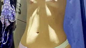 C�mara oculta en un probador de un gran almac�n, capturing latina teens in homemade webcam moments.