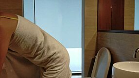 Brunette Showers in Clubhouse, Hot Pee Streams on Legs Close-Up