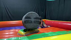 Latina pornstar rides mechanical bull then gets squirted on public street