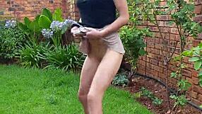 skinny small girl pissing and twerking her tiny ass in the garden
