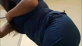 Nurse bends over for patient in hospital