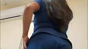 Nurse bends over for patient in hospital