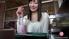 She removes her coat for an erotic shoot. Japanese beauty rides and fingers to climax