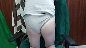 Intense gay masturbation on the chair.