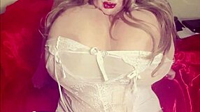 White lingerie girl shows boobs, sucks toy milky.