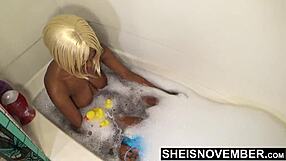 i see msnovember innocent black girl bathing with rubber ducky and big areolas