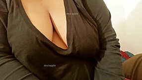 Asian aunty flaunts her big boobs and ass in sexy scene
