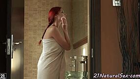 Solo action in the bathroom with a beautiful redhead amateur