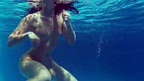 Hungarian pornstar Kittina Ivory reveals her juicy tits and tight pussy underwater in the pool.