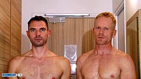 Muscular men with large penises take a shower together