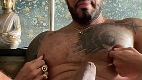 Tattooed Viktor Rom dances naked before masturbating his big black cock