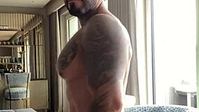 Tattooed Viktor Rom dances naked before masturbating his big black cock