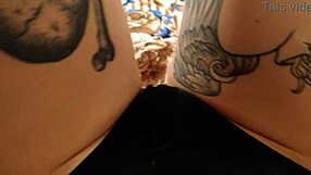 The babe with tattoo uses big dildo for masturbation.