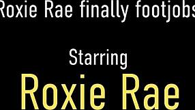 busty milf roxie rae foot fucks your hard cock with her tiny feet