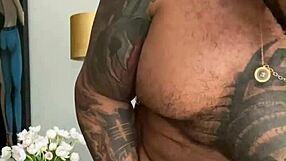 Tattooed Viktor Rom dances naked before masturbating his big black cock