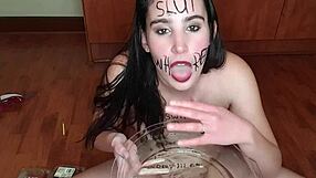 self degrading slut eats piss covered fruits body writing
