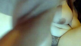 big hot redhead with tattoos has solo fun with toys in her room