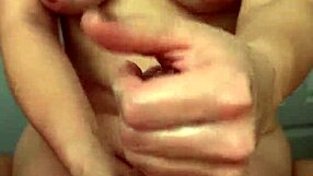 A curvaceous woman with an anime look gives a handjob and a sensual massage with oil to her friend