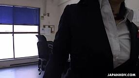 Cute brunette Ritsuko Tachibana swallows a boner in the office.