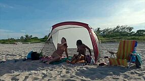 Public beach fun with double handjob and anal action