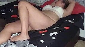 The blond spanish girl wakes me up rubbin my pussy wit her big cock.