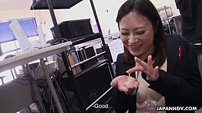 Cute brunette Ritsuko Tachibana swallows a boner in the office.