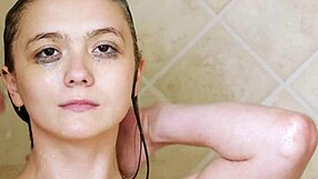 Charming brunette model showers after massage