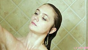 Charming brunette model showers after massage