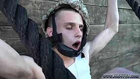 Young army hunks get steamy gay blowjob action