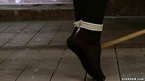 Tied Big Tits Slave Endures Harsh Caning in Bondage