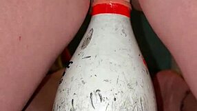 can you believe this milf gets fucked with a bowling pin until she squirts?