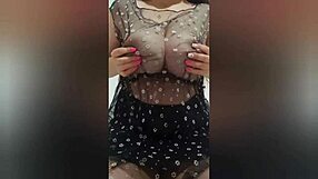 busty beauty shows off big tits in black clothes