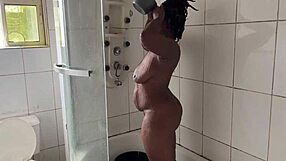 Black African Lesbians Kiss and Lick Natural Tits Roughly in Bathroom