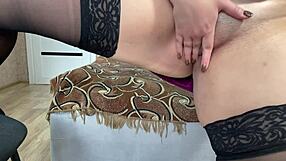 My girlfriend's moans contrast her solo pussy play