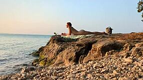 i felt so shy asking a stranger for sunscreen on a nudist beach, but his touch was electric.