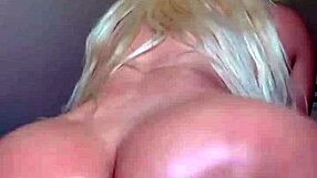 Is this oiled blonde twerking her huge tits and ass?