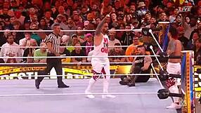 kevin owens and sami zayn wrestle usos for tag titles