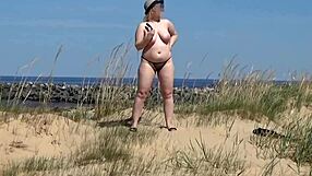 Helping Curvy Female with Juicy Body on Sunny Beach