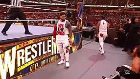 kevin owens and sami zayn wrestle usos for tag titles