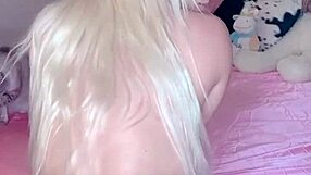 Is this oiled blonde twerking her huge tits and ass?