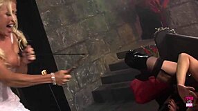 Sexy brunette vampire seduces blonde lesbian for toy-filled bondage fun.