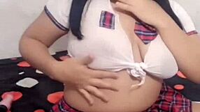 hermosa colegiala shows her big ass and voluptuous vagina