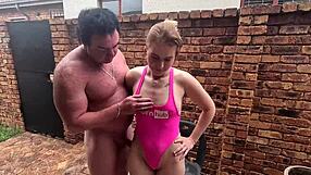 Just sucking and jerking a cock in my skimpy swimsuit outdoors! 😜