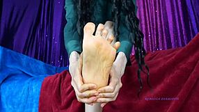 mistress rebecca diamante is massaging her feet in that miniskirt, so sexy and fetish-like with her long hair